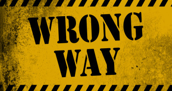 Wrong way sign yellow with stripes