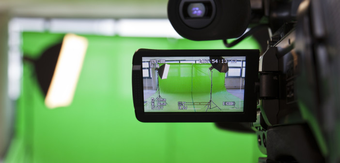 LCD display screen on a High Definition TV camera in a green screen studio.