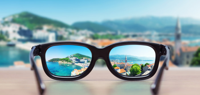 Reflection of a city in sunglasses lenses
