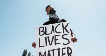 Man holding black lives matter sign